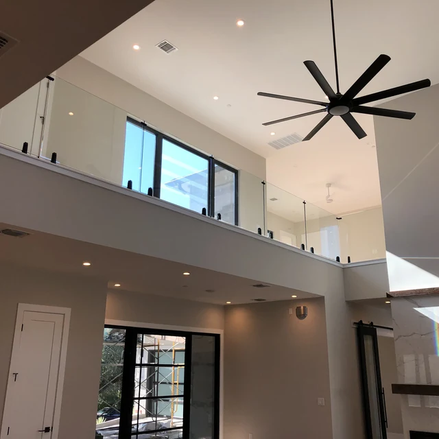 Interior glass balcony railing in modern luxury home — Safe and Clear glass railing system