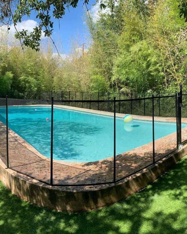 Removable mesh and metal pool safety fence in Fort Worth Texas