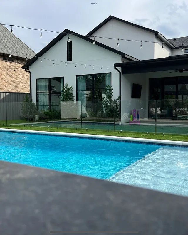 Residential frameless glass pool fence installation in Dallas-Fort Worth